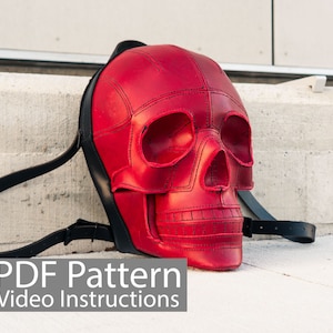 May include: A red leather skull backpack with black straps. The backpack has a stitched design and the text "PDF Pattern Video Instructions" is at the bottom of the image.