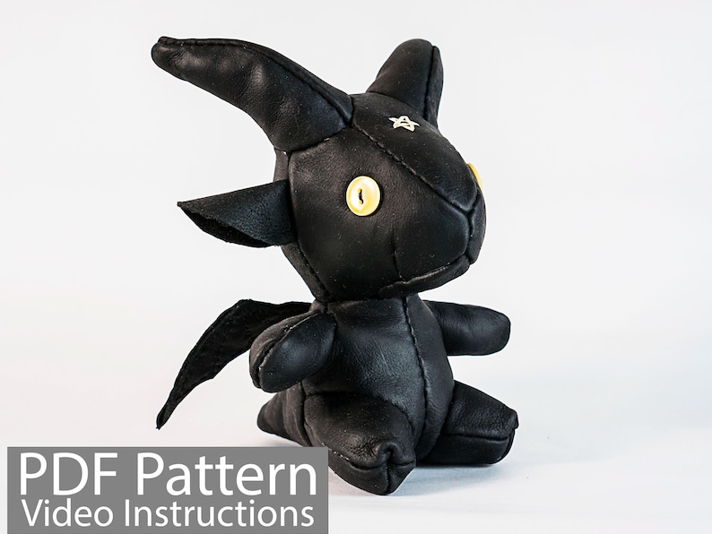 May include: Black leather plush toy shaped like a goat with a star on its forehead and yellow button eyes.  PDF Pattern Video Instructions.