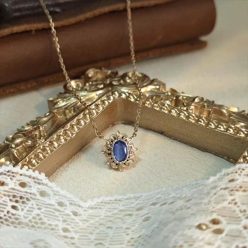 Tanzanithalsband i vintagestil, art déco-tanzanithänge, halsband i naturligt blått tanzanit, elegant ovalt tanzanithänge, vintagegåva