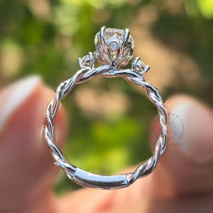 Oval Moissanite Engagement Ring: 14K White Gold Twisted Shank Halo