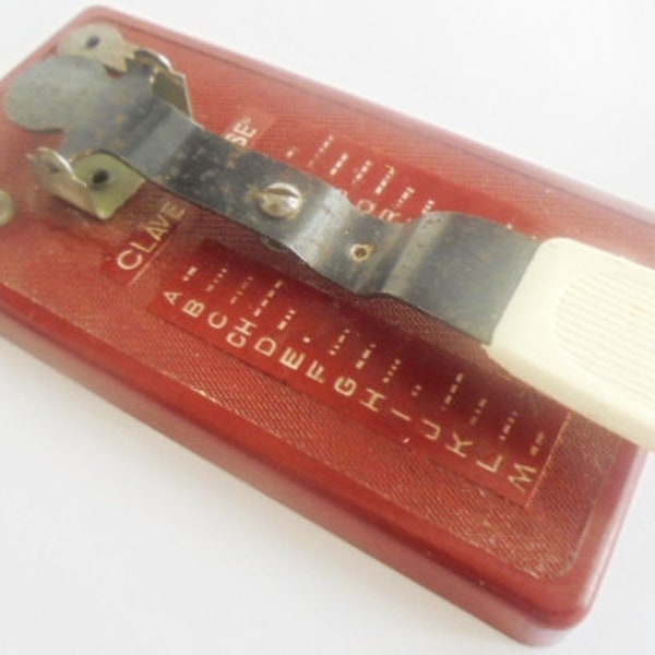 Spain MILITARY ARMY portable pocket telegraph with Morse alphabet in red Bakelite 1950s Original miliataria collector