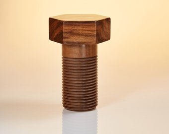 Large decorative screw made of walnut