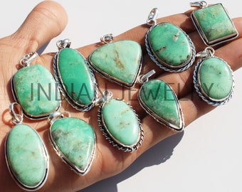 May include: Ten green gemstone pendants with silver settings. The pendants are various shapes, including oval, teardrop, and square.