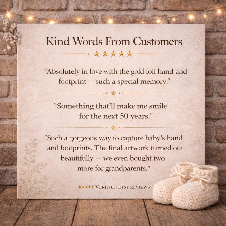 a sign with a quote about the importance of kind words from customers, accompanied by a pair of crocheted baby booties. The sign is set against a brick wall with string lights, creating a warm and inviting atmosphere.