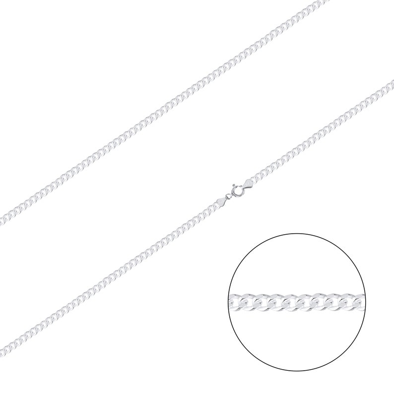 May include: A silver curb chain necklace with a lobster clasp closure. The chain is shown in a close-up view, highlighting the individual links.