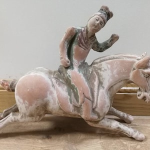 Trio-colored glazed pottery of the Tang Dynasty Pottery figurines,Tang dynasty Tangsancai Tang san cai porcelain Polo player statue antique