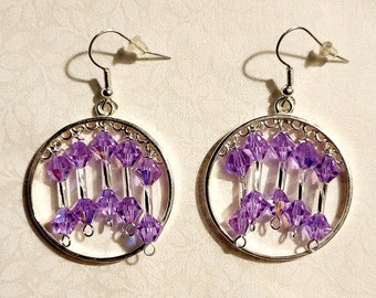 216) Stunning translucent purple bicone beads and silvery twisted bugle beads dangle inside a circular earring chandelier. Gorgeous!