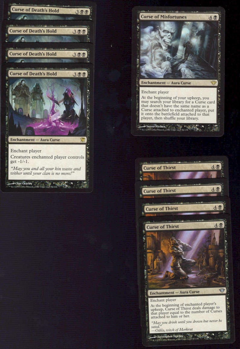 May include: A collection of Magic: The Gathering cards featuring dark fantasy artwork. The cards include "Curse of Death's Hold", "Curse of Misfortunes", and "Curse of Thirst". The cards are black with white text and illustrations.