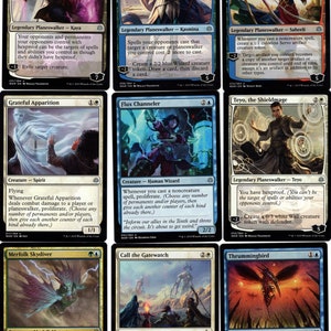 May include: A set of ten Magic: The Gathering cards featuring various characters and abilities. The cards are in a blue, white, and black color scheme with illustrations of fantasy creatures and characters.