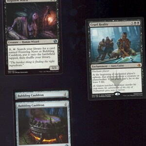 May include: A collection of Magic: The Gathering trading cards. The cards feature illustrations of fantasy creatures and spells. The cards include "Bogbrew Witch", "Cruel Reality", and "Bubbling Cauldron". The cards are in English.