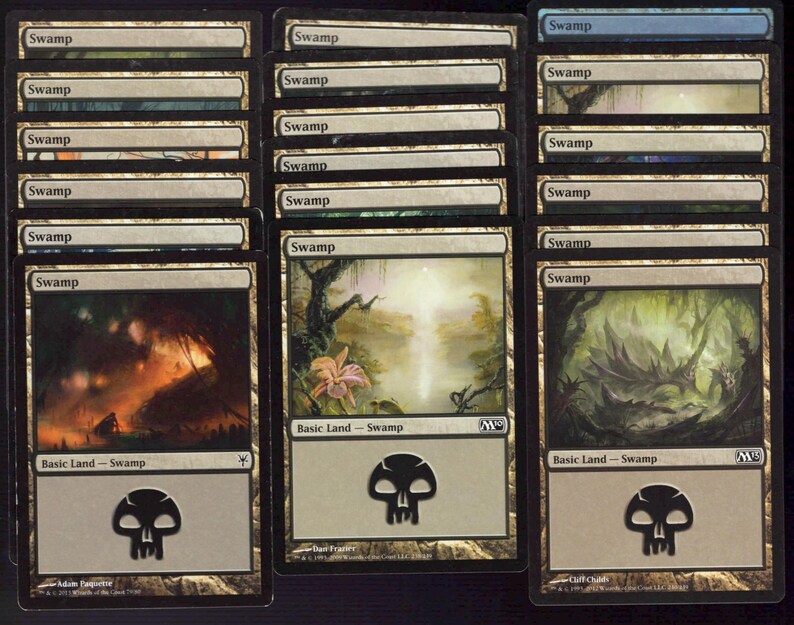 May include: A collection of Magic: The Gathering "Swamp" basic land cards. Each card features swamp-themed artwork, a mana symbol, and the text "Swamp". The cards are in various conditions.