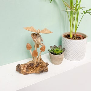 Hand Carved Butterfly Ornament on Wooden Carved Mushrooms Toadstools with Log Base
