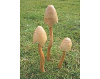 Hand carved wood mushroom with green cotton cord