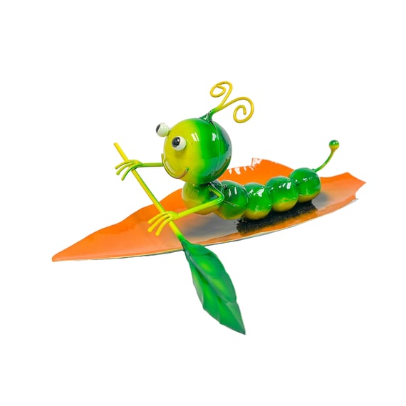 A hand-painted metal caterpillar piloting a tiny rowing boat — whimsical kinetic-adjacent garden art that's genuinely unexpected and cheerful.