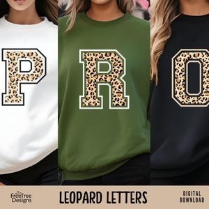 May include: Three sweatshirts with the letters "PRO" in a leopard print design. The sweatshirts are white, green, and black.