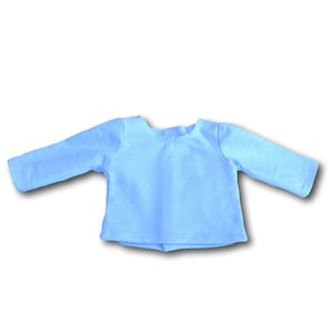 K&ouml;nnte beinhalten: Ein hellblaues Langarmshirt mit Rundhalsausschnitt.