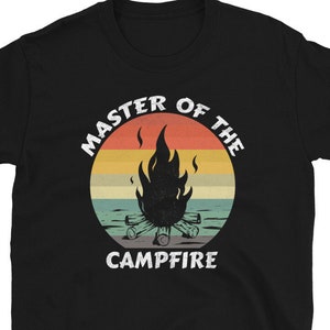 May include: Black t-shirt with a retro-style graphic of a campfire with the text "Master of the Campfire".