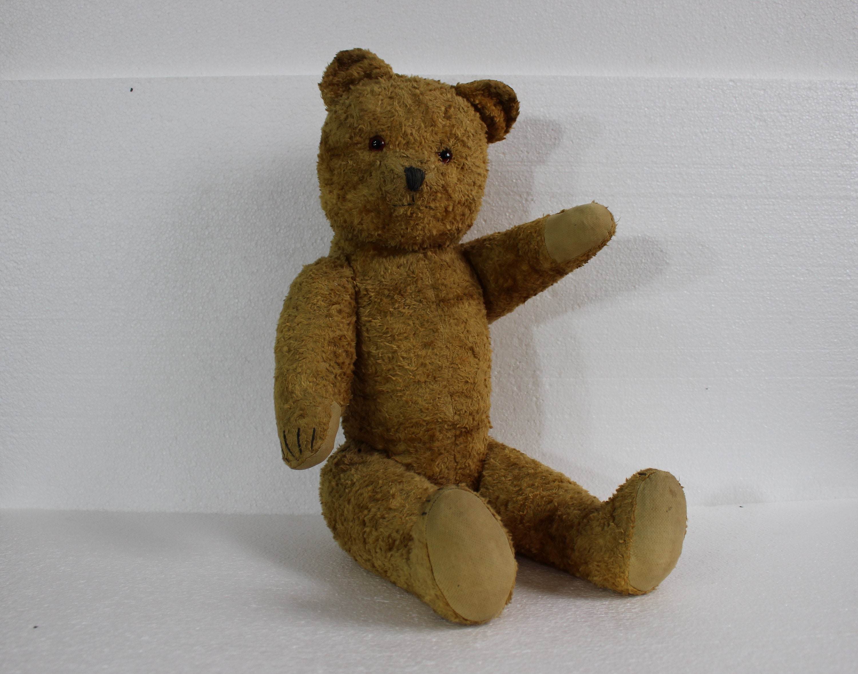 teddy bear with embroidered eyes