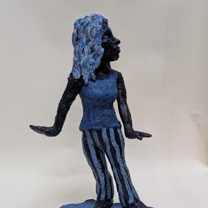 New! blue female skater, trendy clay figure, modern sculpture, female skater statue, unique clay sporting art, blue artwork, unique gift