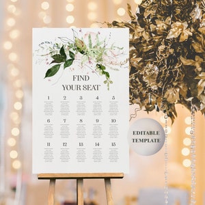 May include: A white seating chart with floral accents and the text "FIND YOUR SEAT" displayed on an easel. The chart is numbered 1-15. A gold leaf arrangement and string lights are in the background. The words "EDITABLE TEMPLATE" are also visible.
