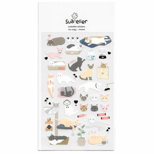 May include: A sheet of stickers featuring various illustrations of cats in different poses and activities. The stickers are on a white background and include a variety of colors, including gray, white, orange, and pink. The text "Suatelier" and "no.s093 : meow" is printed on the sheet.