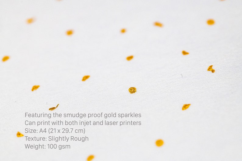 May include: White cardstock paper with gold glitter embedded in the paper. The paper is A4 size (21 x 29.7 cm), slightly rough, and weighs 100 gsm. The text on the paper reads: "Featuring the smudge proof gold sparkles Can print with both inkjet and laser printers Size: A4 (21 x 29.7 cm) Texture: Slightly Rough Weight: 100 gsm"