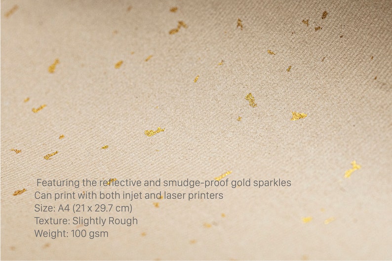 May include: A sheet of textured paper with gold sparkles. The paper is slightly rough and has a weight of 100 gsm. It is suitable for both inkjet and laser printers. The text on the paper reads: "Featuring the reflective and smudge-proof gold sparkles Can print with both inkjet and laser printers Size: A4 (21 x 29.7 cm) Texture: Slightly Rough Weight: 100 gsm"