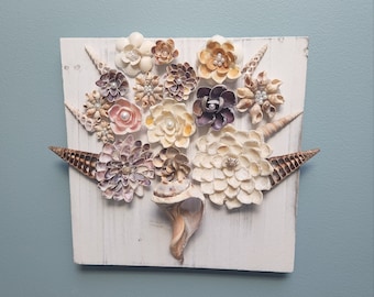 Buquê de flores em concha