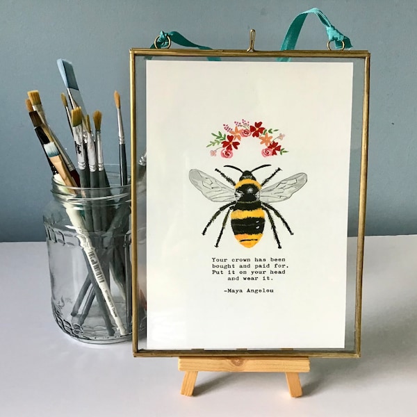 Brass framed Hand painted bee with Maya Angelou quote “Your crown has been bought and paid for….”