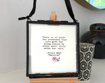 Teacher gift quote typed on an antique typewriter