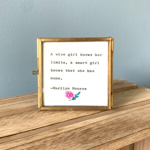 Brass framed vintage typed quote