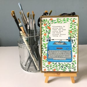 Framed Friendship print - typewriter with typed quote ‘friendship is giving the same advice back and forth without anyone taking it’