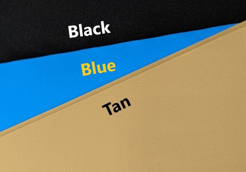 May include: Three fabric swatches, one black, one blue, and one tan. The swatches are arranged in a triangle shape, with the black swatch at the top, the blue swatch in the middle, and the tan swatch at the bottom.