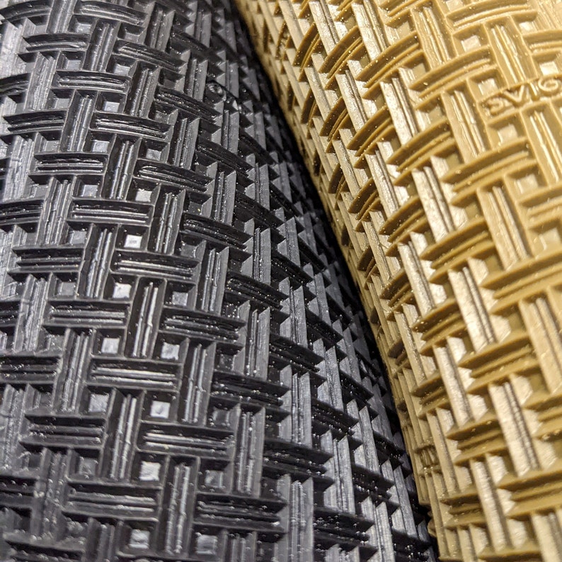 May include: Close-up of two bicycle tyres with different tread patterns. The tyre on the left has a black, diamond-shaped tread pattern. The tyre on the right has a brown, diamond-shaped tread pattern.