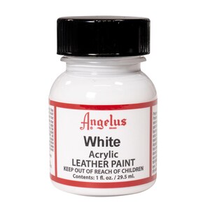 May include: A small white bottle of Angelus brand white acrylic leather paint. The bottle has a black lid and a red label with the text "Angelus White Acrylic Leather Paint Keep Out of Reach of Children Contents: 1 fl. oz. / 29.5 ml."