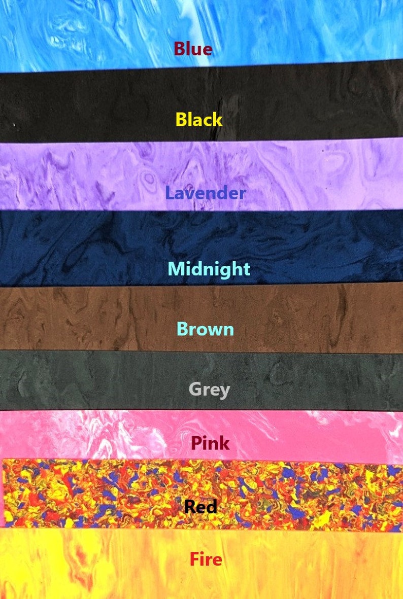May include: A set of ten colorful marbled plastic sheets in various colors, including blue, black, lavender, midnight blue, brown, grey, pink, red, and yellow. The sheets are arranged vertically, with the color names written in red below each sheet.