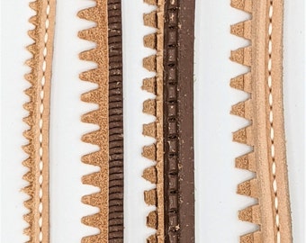 May include: Close-up of three different types of leather trim with decorative stitching. The trim is brown, tan, and cream in color.