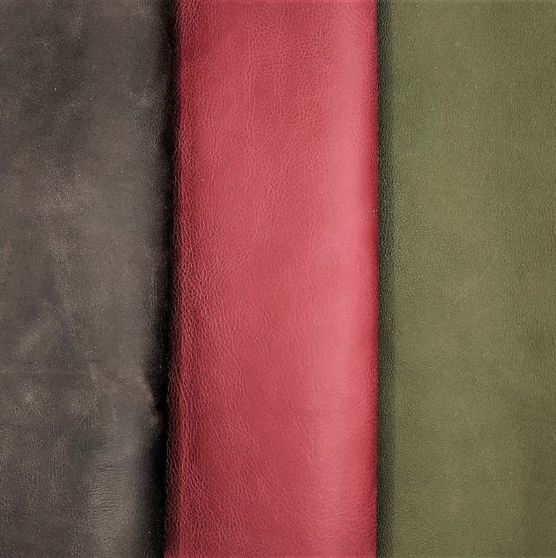 May include: Three fabric swatches, one black, one red, and one green. The swatches are arranged vertically side-by-side.