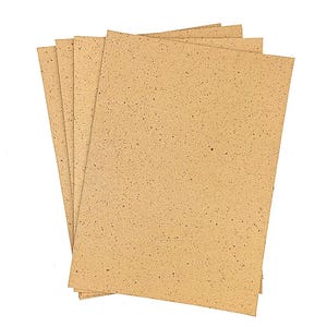 May include: A pile of rectangular, tan-coloured sheets of paper with a speckled pattern. The sheets are slightly fanned out, revealing their edges. The paper has a rough texture and a natural, earthy tone.