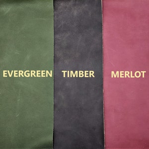 May include: Three leather swatches in different colors: evergreen green, timber brown, and merlot red.