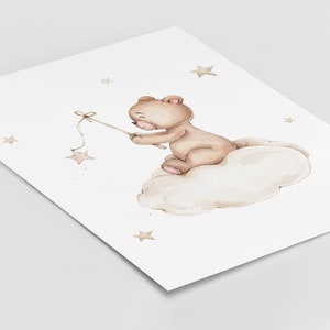 Brown teddy bear on the beige  cloud with stars