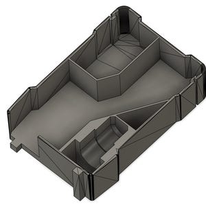 May include: A gray, geometric container with multiple compartments and a curved section. The design features angular walls and a recessed area, suggesting a storage or organizational product. The overall aesthetic is modern and functional.