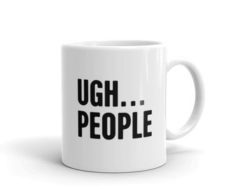 May include: White ceramic coffee mug with black text that reads "UGH... PEOPLE".