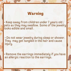 May include: Warning sign with important safety information for jewelry. Keep away from children under 7 years old and pets. Do not wear jewelry while sleeping or showering. Remove earrings immediately if you have an allergic reaction.