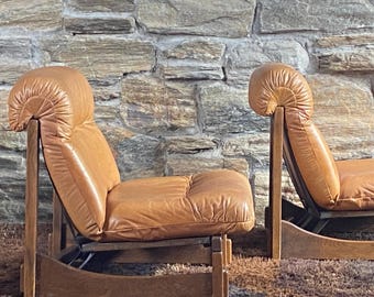 Pair of 1970's German Brutalist oak and leather lounge chairs