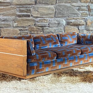 Milo Baughman style oak cased sofa with patchwork velvet upholstery