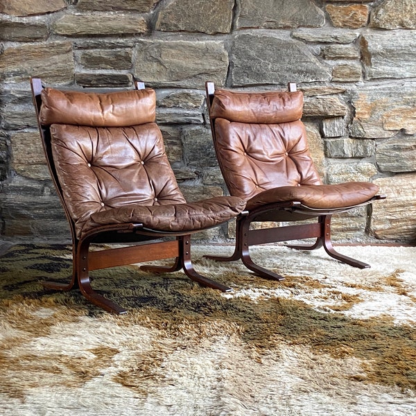 Pair of rosewood and leather Siesta chairs by Ingmar Relling