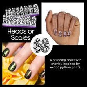 May include: Nail wraps with a black and white snakeskin pattern. The wraps are called "Heads or Scales".