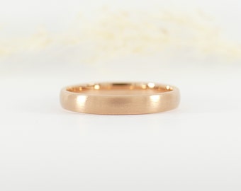 Men's wedding ring in 14 carat red gold with a width of 3.50 mm and a longitudinally matt surface.