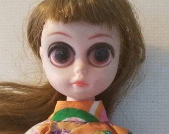 sad eyes doll